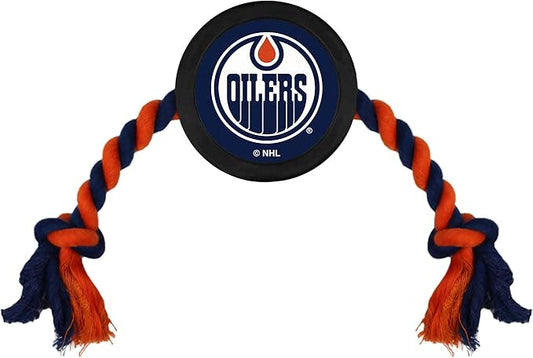 Pets First NHL Edmonton Oilers Puck Toy for Dogs & Cats. Play Hockey with Your Pet with This Licensed Dog Tough Toy Reward! 15 inches long